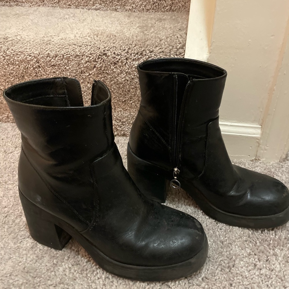 Heeled black booties